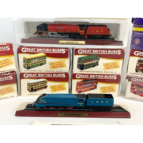 147 - A collection of Atlas Editions model trains and buses.