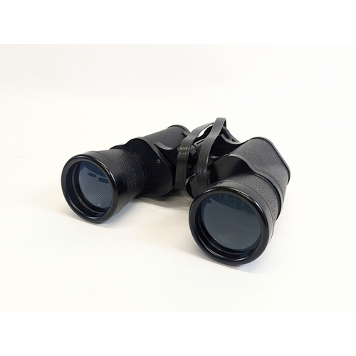 205 - A pair of binoculars in case.