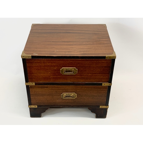 191 - A Campaign style brass bound mahogany chest of 2 drawers. 46 x 38.5 x 34.5cm.