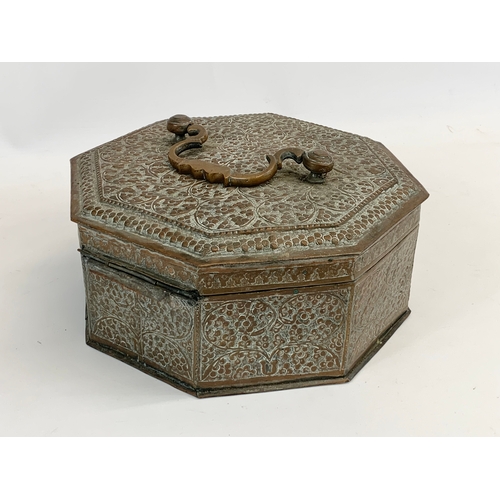 208 - A late 19th century / early 20th century Indian copper spice box. 28 x 28 x 12cm