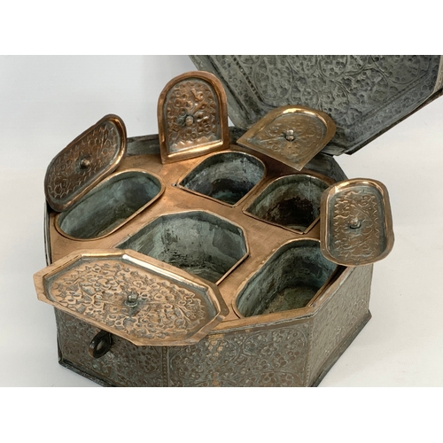 208 - A late 19th century / early 20th century Indian copper spice box. 28 x 28 x 12cm