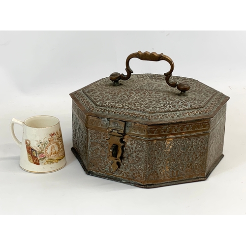 208 - A late 19th century / early 20th century Indian copper spice box. 28 x 28 x 12cm