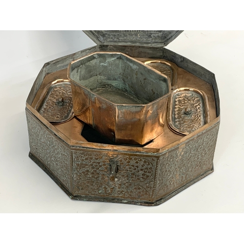 208 - A late 19th century / early 20th century Indian copper spice box. 28 x 28 x 12cm