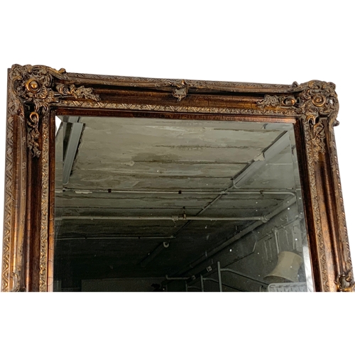 214 - A large ornate framed mirror. Model “Bodium Bronze Crackle” 102 x 127cm