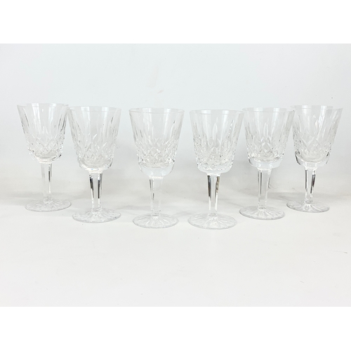 522 - A set of 6 Waterford crystal “Lismore” pattern drinking glasses. 14.5cm