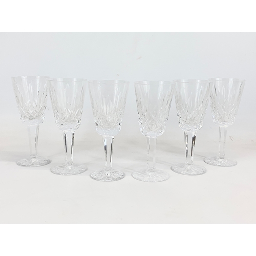 521 - A set of 6 Waterford crystal “Lismore” pattern glasses. 13cm.