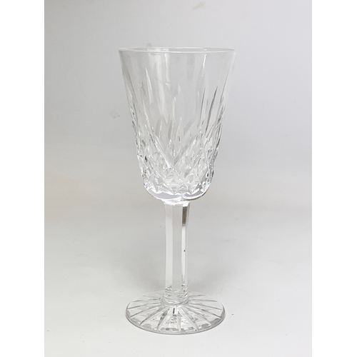 521 - A set of 6 Waterford crystal “Lismore” pattern glasses. 13cm.