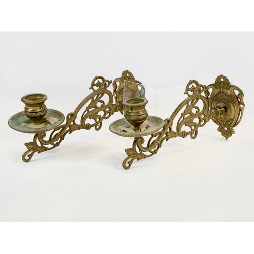 218 - A pair of vintage brass wall scones. 23cm