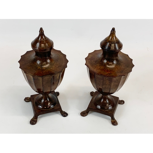 226 - A pair of 19th century bronzed spelter urns with lids. 23cm