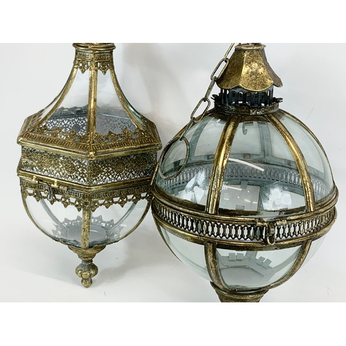 229 - 2 ornate brass hanging lanterns. 47cm