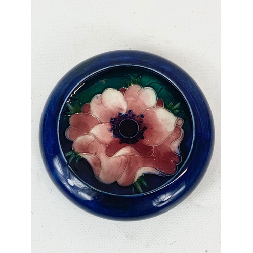 412A - A Moorcroft Anemone pattern dish. 11cm