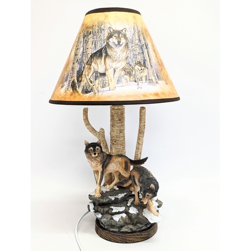 572 - An Al Agnew Spirit of The Forest Wolf Art Table lamp by The Bradford Exchange. 41cm including shade.