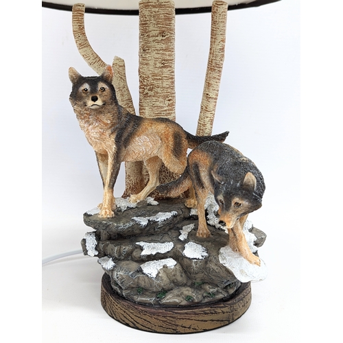 572 - An Al Agnew Spirit of The Forest Wolf Art Table lamp by The Bradford Exchange. 41cm including shade.