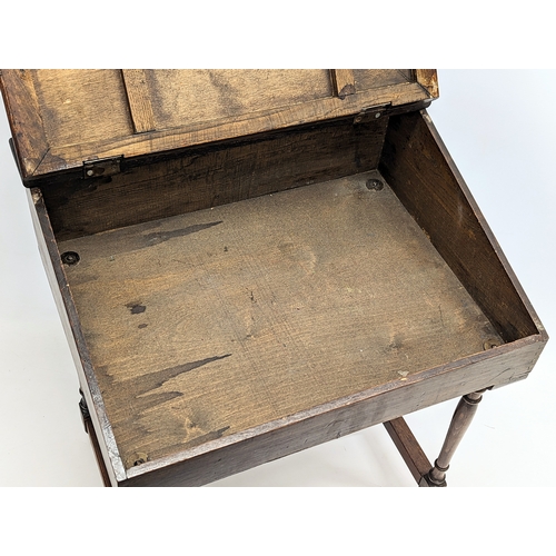 238 - A 1930s Triang children's desk. 49.5x39.5x60.5cm