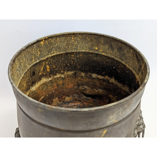 244 - An early 20th century 2 handled brass coal bucket in Regency style. 27x30cm