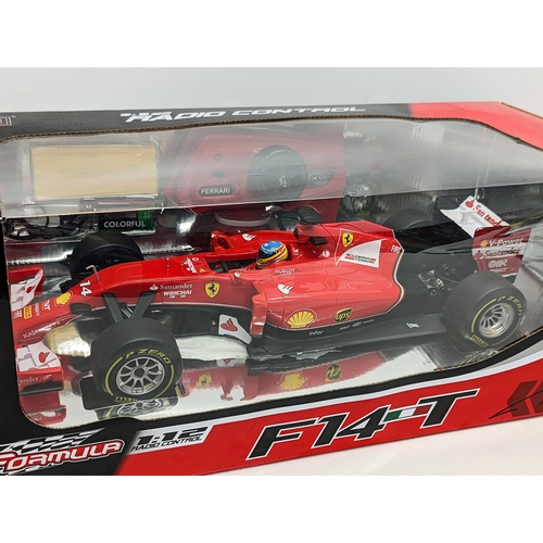 264 - An XFormula F14-T Ferrari radio controlled racing car.