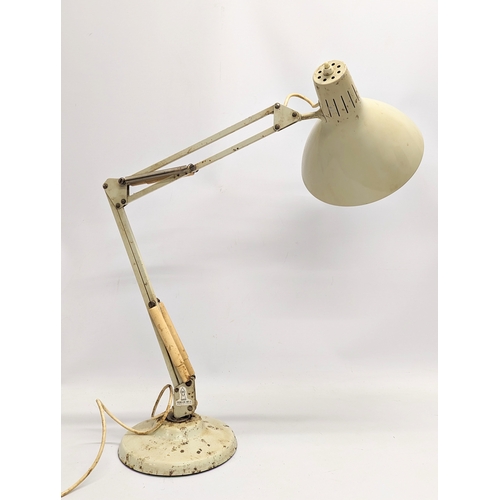 332 - A Mid century anglepoise lamp by Thousand & One Lamps Ltd. 63cm