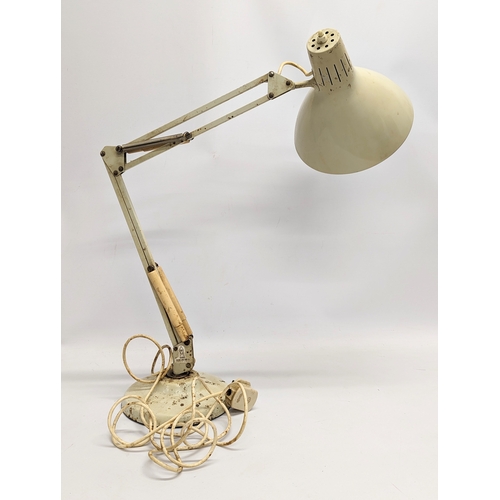 332 - A Mid century anglepoise lamp by Thousand & One Lamps Ltd. 63cm