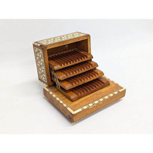 277 - An inlaid musical cigarette box. 17x13.5x10cm