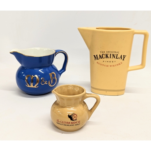 529 - 3 pottery jugs, including The Glenmorangie Single Highland Malt whisky jug