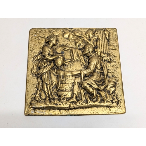 532 - An early 20th century heavy brass religious plaque. 