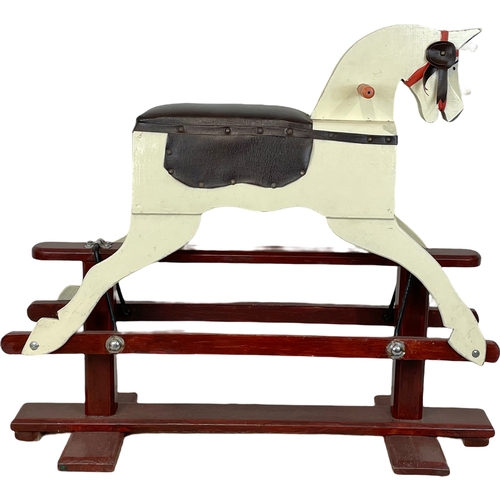 294 - A vintage child’s wooden rocking horse. 91 x 78cm