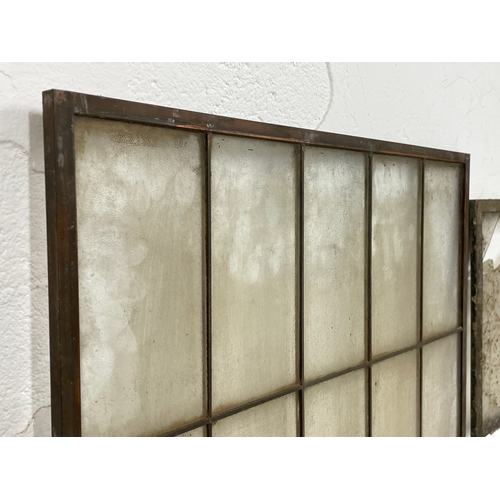 303 - 3 Edwardian heavy copper framed panels. The pair measure 42.5 x 96cm