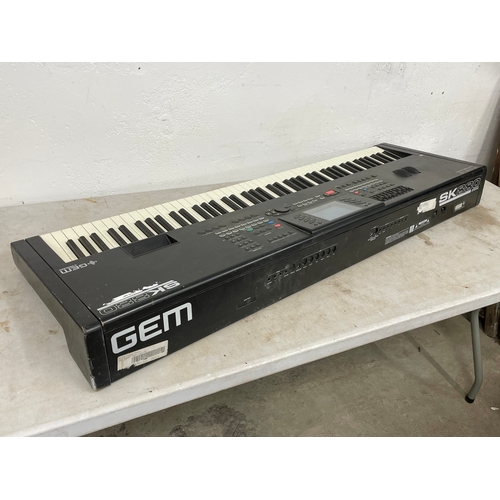 304 - A Gem SK 880 World Keyboard. By General Music. 135cm