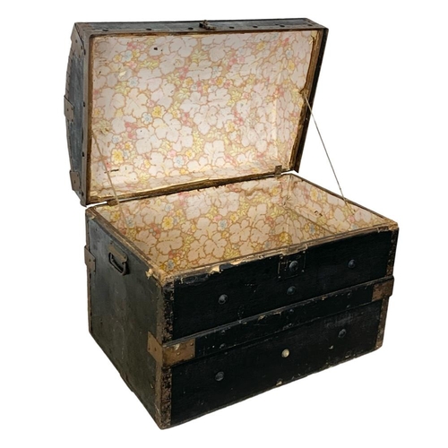 350 - An early 20th century dome top trunk. Circa 1900. 68 x 45.5 x 54.5cm