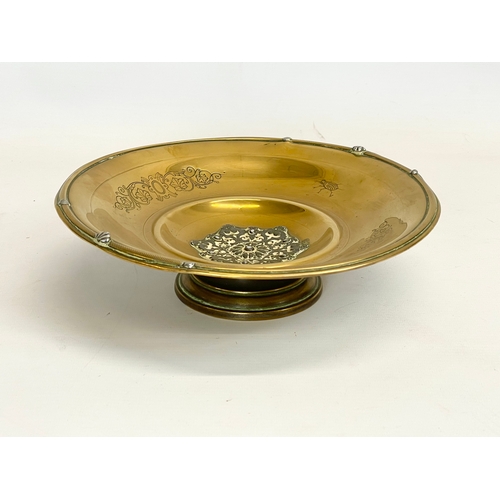 570 - A vintage WMF brass bowl. 25 x 7.5cm