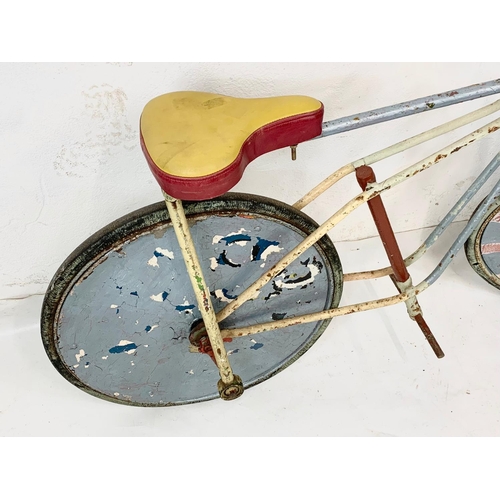 16 - A vintage 1950’s Clown Carnival Bike. 150cm.