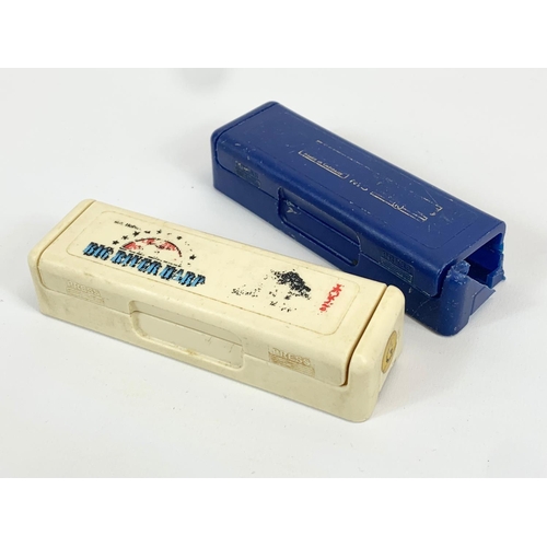 1 - 2 Hohner harmonicas in cases. Blues Bender. Marine Band.