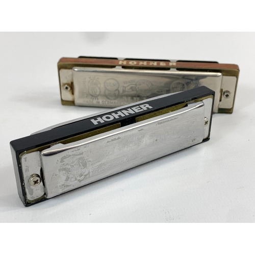 1 - 2 Hohner harmonicas in cases. Blues Bender. Marine Band.