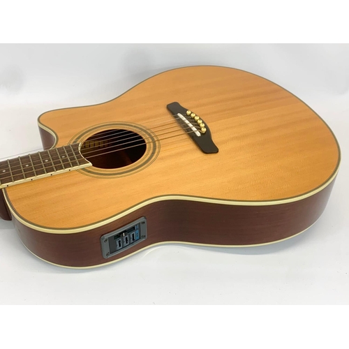 26 - A Fenix guitar. Model EA 90 NAT. Serial 6509108. 108cm