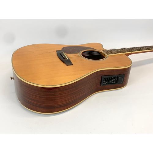 31 - A guitar by Boorinwood. 105cm