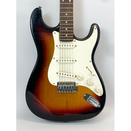 39 - An electric guitar by Westfield. 99cm