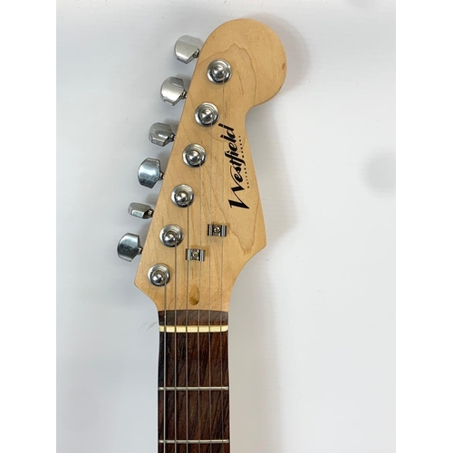 39 - An electric guitar by Westfield. 99cm