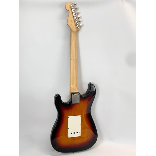 39 - An electric guitar by Westfield. 99cm