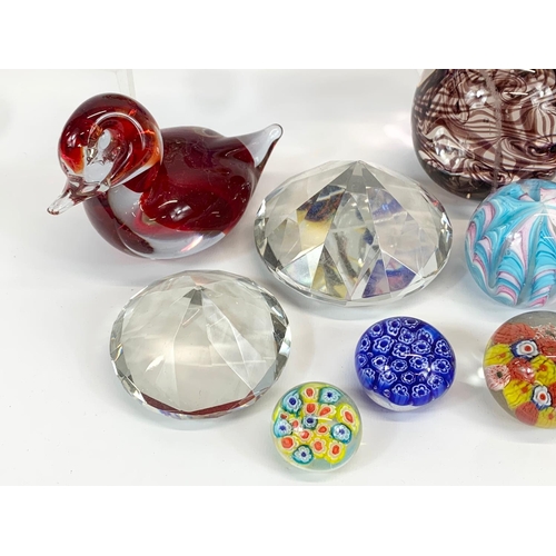 394 - A collection of Art Glass paperweights. Largest 10 x 9cm.