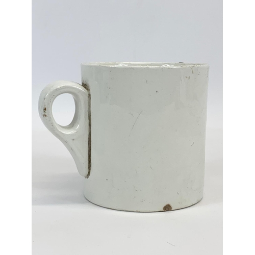 405 - An early 20th century Belfast Union pottery mug by Dunn Bennett & Co LTD. 14 x 10.5cm