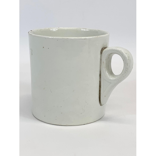 405 - An early 20th century Belfast Union pottery mug by Dunn Bennett & Co LTD. 14 x 10.5cm