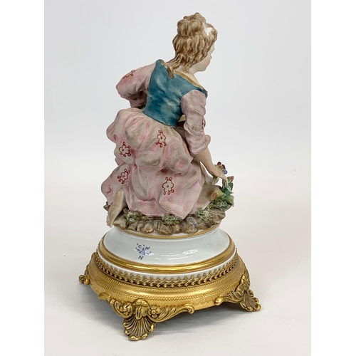 408 - 2 Capodimonti porcelain figurines on ornate brass bases. Tallest measures 28cm