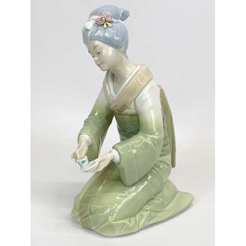 411 - 3 Spanish porcelain figurines. 1 by Lladro 27cm