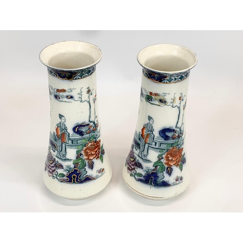 430 - A pair of early 20th century Corona Ware “Perak” pattern pottery vase. 24cm