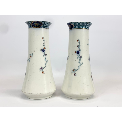 430 - A pair of early 20th century Corona Ware “Perak” pattern pottery vase. 24cm