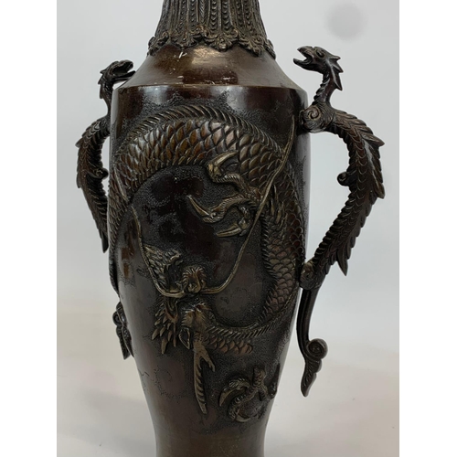 433 - A late 19th century Japanese Bronze vase. 17 x 31cm