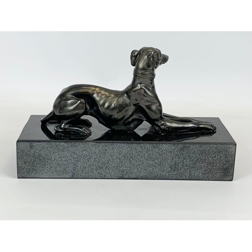 434 - A Bronze Greyhound on heavy slate base. 27 x 11 x 16cm.