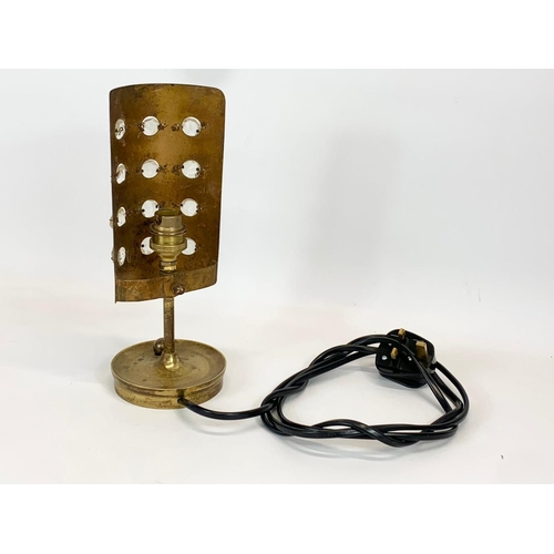 436 - A vintage brass lamp. 26cm