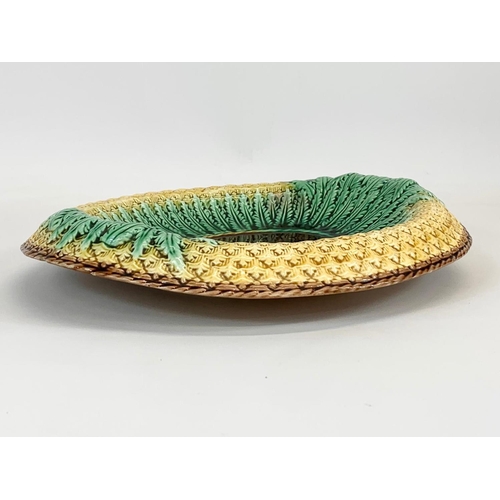 438 - A late 19th century Majolica pottery Bread Plate. 32 x 27cm.