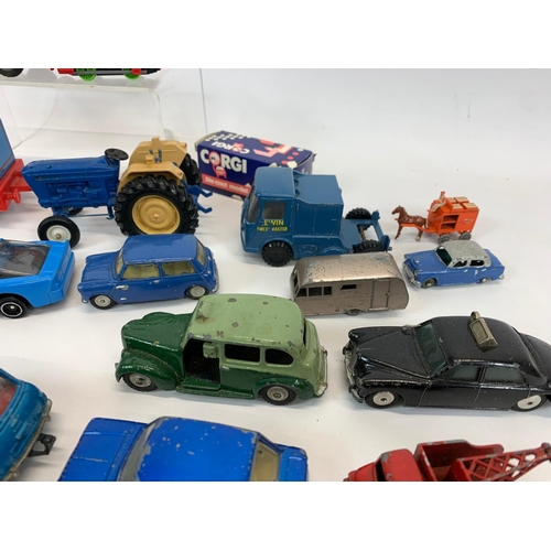 54 - A collection of model cars and trucks. Dinky, Corgi, Lesney.